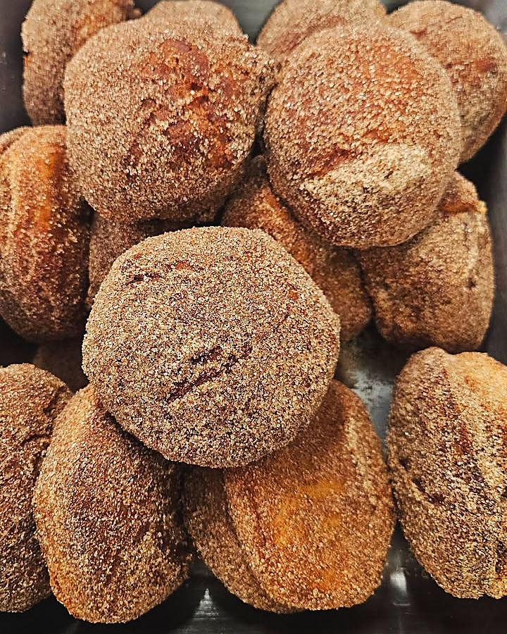 Sugar-coated donuts in the pan
